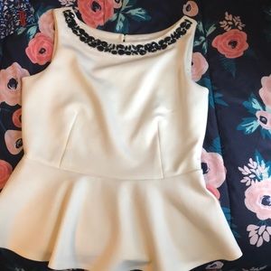 White top with black beading